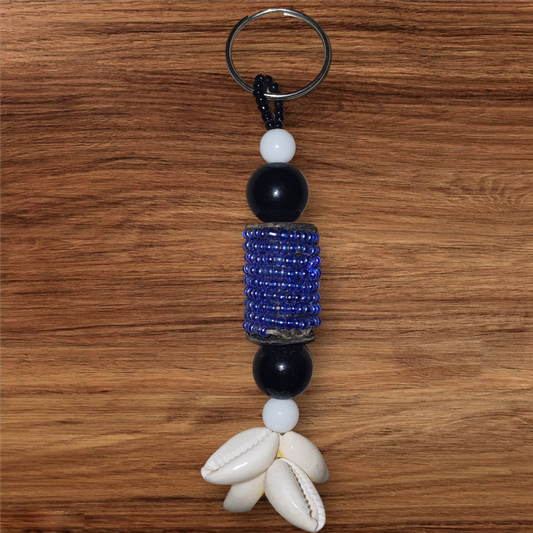 PORTE CLEF VIOLET AVEC REFLET EN PERLES